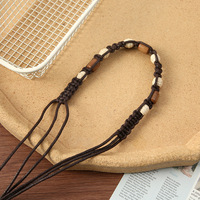Chaîne de taille vintage bohème faite à la main avec perles en bois tressées, design ethnique tribal, cordon de taille réglable, accessoire vestimentaire pour l'été et la plage