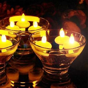 12Pcs impermeabile senza fiamma galleggiante Tea Candle Lights funzionamento a batteria tremolante <span class=keywords><strong>Tealight</strong></span> bianco caldo per la festa nuziale piscina SPA - Product Image 2