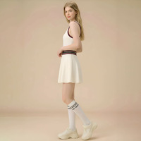 Robe de sport pour femmes à dos ajouré et couleurs contrastées, avec rembourrage antichoc, taille ajustée, ensemble jupe de golf et de tennis avec poches