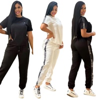 Ropa de Marca al por Mayor para Mujer, Nuevo Conjunto de Dos Piezas Casual de Moda, Top de Manga Corta y Pantalones Largos con Jacquard