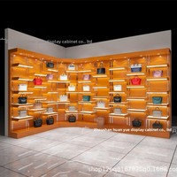 Vitrine à chaussures lumineuse orange, fabriquée à la main, avec revêtement en poudre, pour centres commerciaux, design personnalisable, pour entreprises