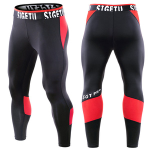Mallas de entrenamiento deportivas para gimnasio sólidas para hombre, pantalones de compresión para correr, mallas de secado rápido para actividades deportivas al aire libre - Product Image 1
