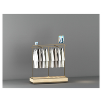 Raccords de magasin de détail d'usine conception fer bois peinture chrome support de sol magasin de vêtements présentoir pour dames