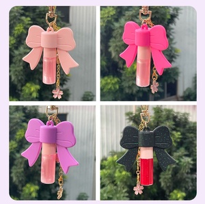 เคสใส่ลิปสติกซิลิโคนรูปโบว์น่ารัก พวงกุญแจแบบพกพา พร้อมคลิปหนีบกุญแจ อุปกรณ์เสริมเครื่องสำอางสุดแฟชั่นสำหรับผู้หญิง - Product Image 6