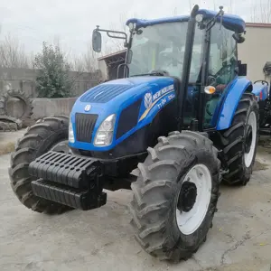 Tractores de rueda agrícola de segunda mano y calidad, maquinaria agrícola 4x4WD, T1104, New Holland, con cabina