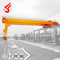 Grue semi-portique mobile électrique sur mesure pour entreprises industrielles, utilisée en extérieur, capacité de levage 25 tonnes