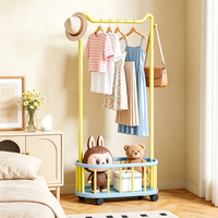 Porte-manteau multifonctionnel autoportant à plusieurs niveaux, présentoir de vêtements en PP et acier au carbone, couleurs macaron, pour boutique