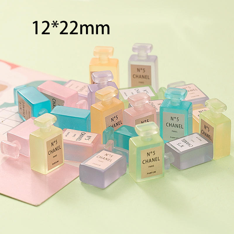 Cheveux aléatoires de bouteille de parfum lumineuse mélangée