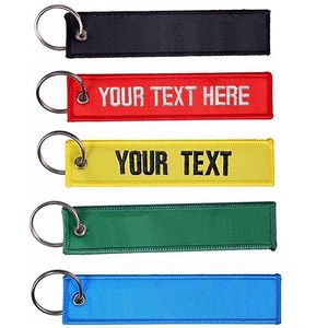 パイロット刺繍織り金属合金リングテキストパターンキータグギフト用のカスタマイズされた両面PVCプラスチック生地キーホルダーセット - Product Image 1