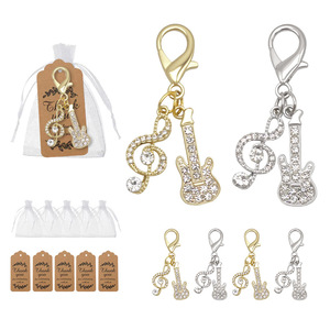 Porte-clés en métal incrusté de diamants en forme de note de musique, cadeau idéal pour les concerts de musique, vente chaude - Product Image 2
