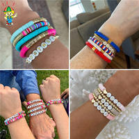 Vente en gros de bracelets boucles d'oreilles et colliers 24 couleurs 5040 pièces de perles rondes et plates en vinyle africain 6mm perles d'espacement en argile polymère