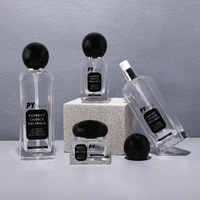 Ensemble de bouteilles cosmétiques en verre carré clair givré luxueux de 100ml avec couvercle sphérique et pompe à lotion pour l'emballage de sérum de soin de la peau
