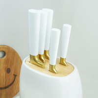 Ensemble de 6 couteaux en acier inoxydable ultra-affûtés avec revêtement doré et bloc en plastique