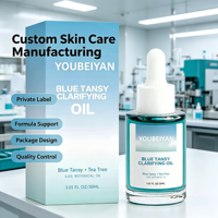 Marque propre, huile de teinture bronzante naturelle et biologique à l'arbre à thé et au jojoba, soin hydratant pour la peau, visage bleu.
