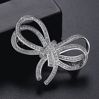 Broche en forme d'arc en zircon CZ, vente chaude, zircon cubique glacé, broche en forme d'arc, bijoux pour femmes