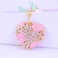 Porte-clés en alliage plaqué or pour femme, petit pendentif en métal en forme de flacon de parfum, breloques trèfle à quatre feuilles, accessoires de sac