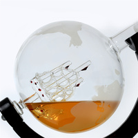 Décanteur en verre en forme de globe créatif à haute teneur en borosilicate de 900ml avec logo personnalisé en gros