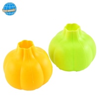 Outils de cuisine originaux en gros, éplucheur d'ail en silicone en forme d'ail pour gadget de cuisine