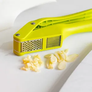 Multifunctional Plastic Garlic Press and Peeler 2 in 1 Manual Kitchen <b>Tool</b> with Wide Handle and Double Slot Chopper Mincer - Product Image 4
