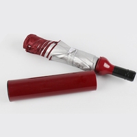 Mini parapluie à bouteille de couleur unie pour adultes, design à trois plis à la mode avec contrôle manuel de l'ouverture à la main et poignée en plastique
