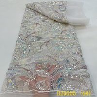 Tissu en dentelle écologique fait main avec perles et sequins brodés pour garniture de vêtement