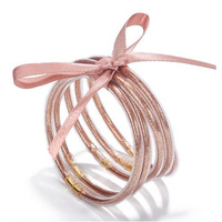 Bracelets en silicone souple scintillants avec nœud doré pour femme, bijoux empilables tendance, cadeau de fête, marque privée sous licence