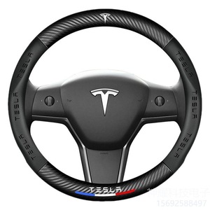 Housse de volant de voiture en Alcantara Housse de volant en fibre de carbone avec logo pour <span class=keywords><strong>Tesla</strong></span> <span class=keywords><strong>Model</strong></span> <span class=keywords><strong>3</strong></span> <span class=keywords><strong>Model</strong></span> Y <span class=keywords><strong>Model</strong></span> <span class=keywords><strong>S</strong></span> - Product Image 1