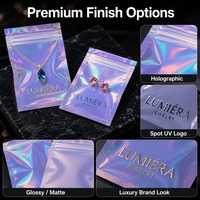 Broche personnalisée emballage de bijoux sac en plastique de qualité alimentaire scellabilité anneau boucle d'oreille emballage holographique mylar sac avec logo