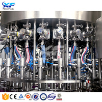 Nouvelle ligne de production de machines de remplissage automatique d'huile comestible Peak pour le remplissage et le bouchage de bouteilles d'huile de cuisson