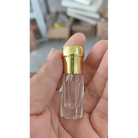 Vente en gros de 3ml de bouteille en verre de parfum d'huile de couvercle en alliage de zinc bouteille en verre vide avec joint de pulvérisateur de pompe