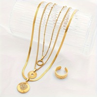 YYN Promotion : Ensemble de bijoux haut de gamme en acier inoxydable, comprenant une bague, une chaîne serpent et un motif d'amour orné de diamants, style bouddhiste tendance