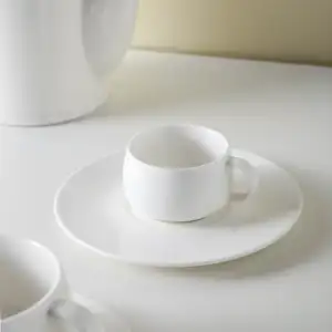 Quyến rũ thiết kế đơn giản bán buôn buổi chiều teatim sứ Tea Cup Bộ đồng bằng màu trắng gốm Mug với chiếc đĩa