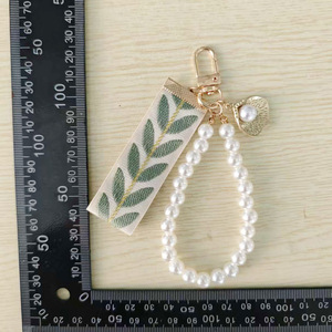 <span class=keywords><strong>Porte</strong></span>-clés en tissu à motif feuille avec pendentif coquille métallique, chaîne de sac à main en perles, accessoires de breloque de sac <span class=keywords><strong>DIY</strong></span> - Product Image 2