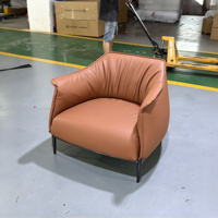 Fauteuil de détente individuel en cuir minimaliste italien, fauteuil d'appoint de luxe design pour villa et balcon