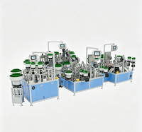 Machine d'assemblage automatique de charnières de meubles pour la production de charnières de meubles