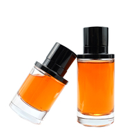 Flacon de parfum en verre transparent vide de luxe OEM en forme de cylindre de 50 ml et 100 ml avec bouchon magnétique