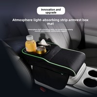 Coussin de boîte d'accoudoir de voiture multifonctionnel en cuir absorbant la lumière ambiante, avec support surélevé, porte-gobelet et rangement pour téléphone portable