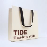 Maßgefertigte Blumenmuster-Geschenktüte aus Recyclingmaterialien mit Seilgriff und Slogan-Druck Elegante Verpackung für Geschenke und Kosmetik