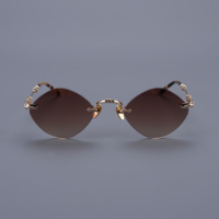 Lunettes de soleil œil-de-chat de luxe sans monture en titane, verres dégradés marron, logo personnalisé, fabricant de lunettes OEM ODM sous marque privée