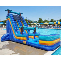 Toboggan aquatique gonflable commercial en PVC coloré bleu tropical avec piscine et palmier géant pour fêtes en extérieur – En stock