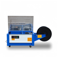Machine de cerclage semi-automatique 006 à table basse, cycle rapide 1,5 seconde, cerclage de cartons et de colis avec bande PP