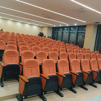 Chaises pliantes modernes en tissu et plastique PP avec pieds en fer, idéales pour les auditoriums, bureaux, écoles et théâtres.