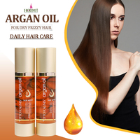 Huile d'argan naturelle antioxydante réparation cheveux crépus cuir chevelu nourrissant vitamine protéine infuser laisser lisse cheveux doux OEM/ODM