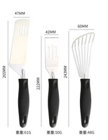 Nouvelle arrivée Spatule à fente en acier inoxydable PP de haute qualité