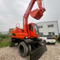 Transfert rapide, économie de carburant, contrôle précis, excavatrice sur pneus d'occasion Doosan Dh150w7, moteur hydraulique 150, engrenage, entretien routier, urbain