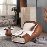 Gants de boxe italiens légers de luxe en forme spéciale chaise canapé en fibre de verre art créatif en cuir chaise longue de loisirs unique