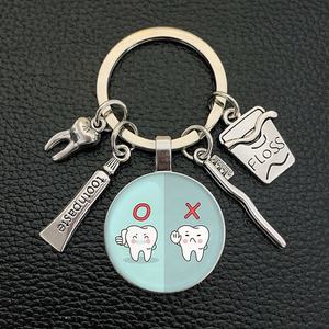 Porte-clés en forme de dent mignon et beau cadeau populaire dans la clinique d'orthodontie dentaire <span class=keywords><strong>tout</strong></span> <span class=keywords><strong>le</strong></span> <span class=keywords><strong>monde</strong></span> aime - Product Image 5