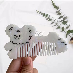 Peigne à cheveux en forme de chien de dessin animé mignon accessoire de cheveux élégant simple et ludique pour filles en acétate - Product Image 6