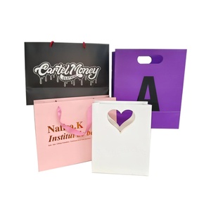 Custom Luxury High Quality Packaging Paper <b>Bag</b> Clothing Shopping Paper <b>Bag</b> <b>Gift</b> Paper <b>Bag</b> With Handle - Product Image 1