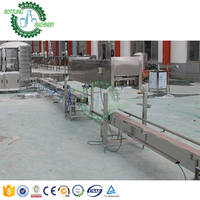 Machine d'emballage en film plastique pour bouteilles et seaux de 3, 4 et 5 gallons en acier inoxydable SUS304